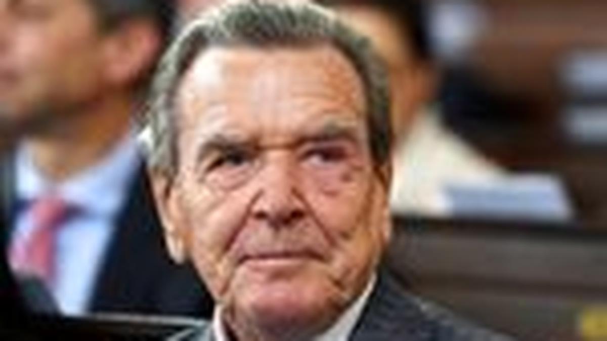 Former German Chancellor Gerhard Schroeder attends an ecumenical service on occasion of the celebration of the German reunification in the St. Michaelis church in Hamburg, Germany, Tuesday, Oct.3, 2023.     Gregor Fischer/Pool via REUTERS