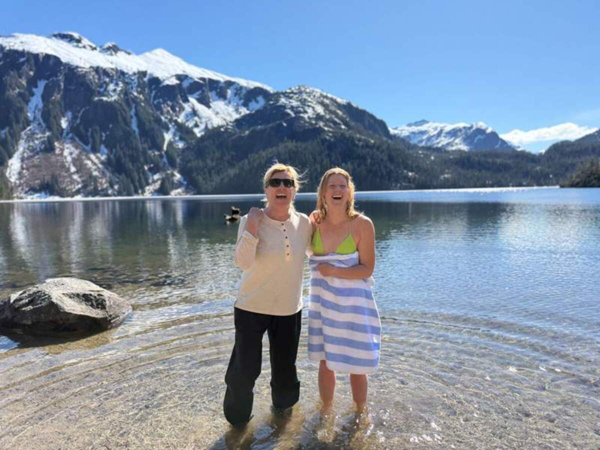  Mimi and Megan in Baranof Lake after Megan took the icy plunge. Photo courtesy: Mimi Slawoff 