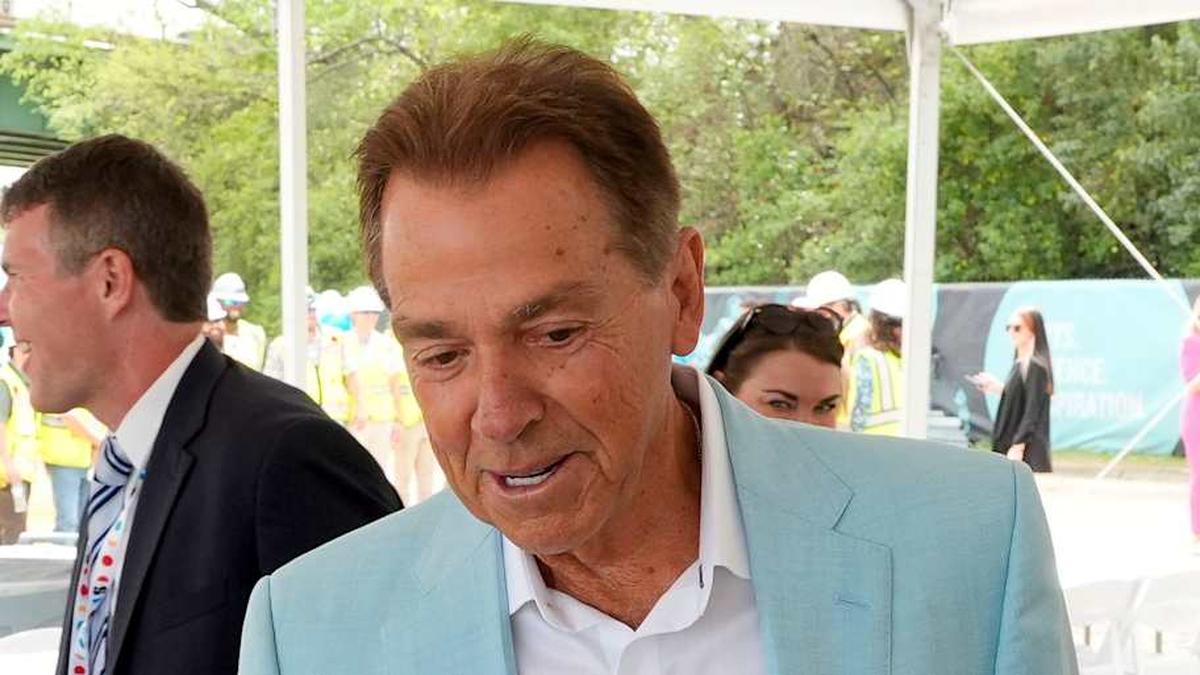  March 30, 2026; Tuscaloosa, AL, USA; Nick Saban greets members of the Stone Building Company construction crew at the Saban Center Topping Out ceremony. | Gary Cosby Jr. / USA TODAY NETWORK via Imagn Images 