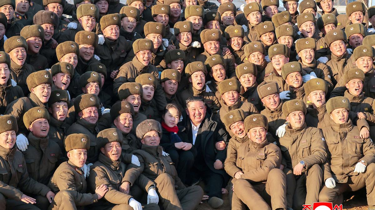 This picture taken on Jan. 5, 2026, and released by North Korea's official Korean Central News Agency (KCNA) via KNS on Jan. 6, 2026, shows North Korean leader Kim Jong Un, center, and his daughter Kim Ju Ae participating in a tree-planting ceremony at the construction site of the Memorial Museum of Combat Feats at the Overseas Military Operations in Pyongyang. (AFP via Getty Images/TNS)