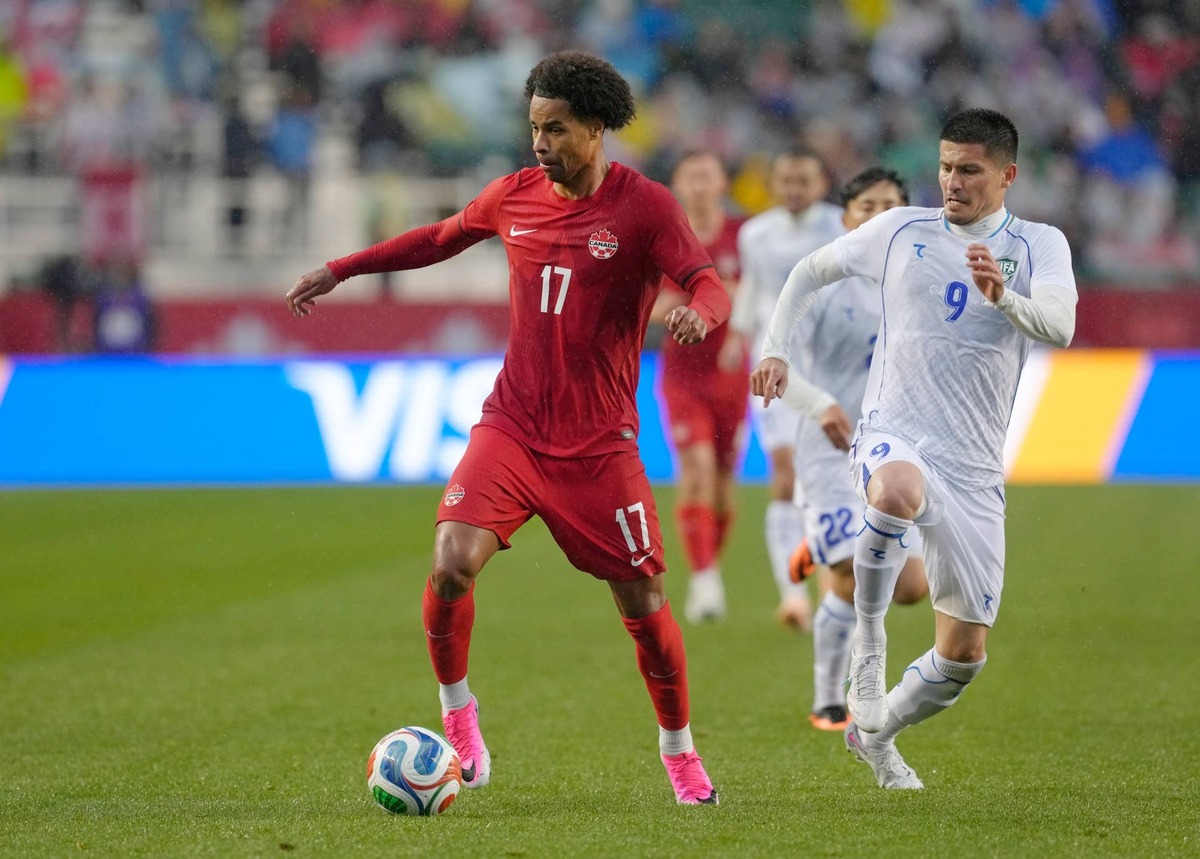  Tajon Buchanan #17 of Canada and Odiljon Xamrobekov #9 of Uzbekistan run after a loose ball during their international friendly match at Commonwealth Stadium on June 1, 2026 in Edmonton, Canada. (Photo by Jeff Vinnick/Getty Images) Photo by Jeff Vinnick/Getty Images