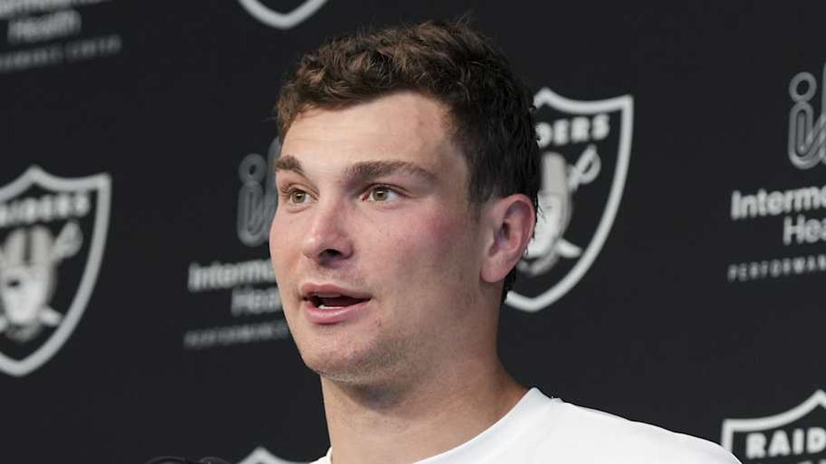  May 2, 2026; Henderson, NV, USA; Las Vegas Raiders quarterback Fernando Mendoza (15) speaks during a news conference at the team's Rookie Minicamp at Intermountain Health Performance Center. Mandatory Credit: Candice Ward-Imagn Images | Candice Ward-Imagn Images 