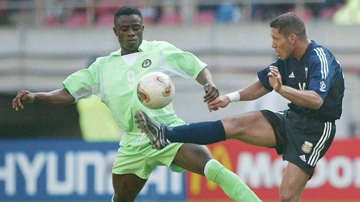  Uche donned Nigeria's No. 9 shirt in the Far East. | Martin Rose/Bongarts/Getty Images 
