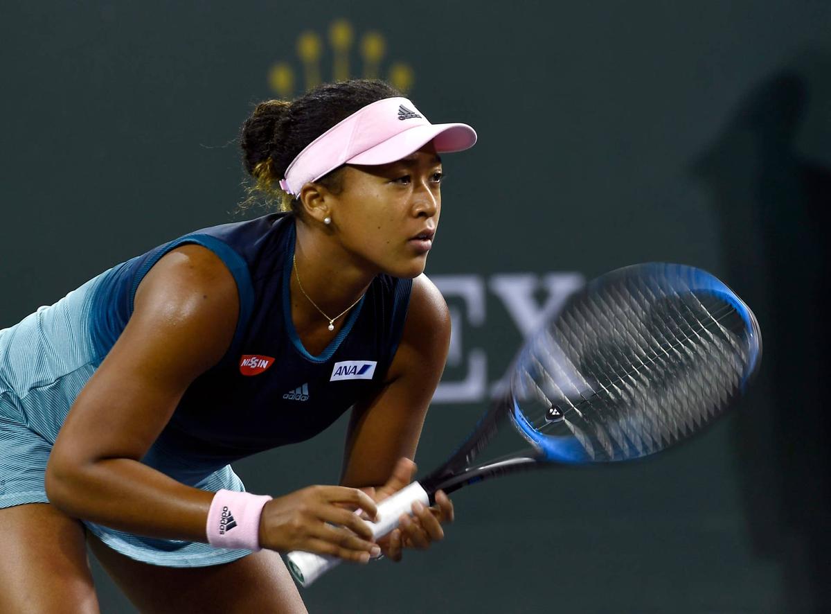  INDIAN WELLS, CA - MARCH 09: Naomi Osaka of Japan twirls her racket as she waits for serve from Kristina Mladenovic of France during their second round womens singles match during day six of BNP Paribas Open on March 9, 2019 in Indian Wells, California. (Photo by Kevork Djansezian/Getty Images) 
