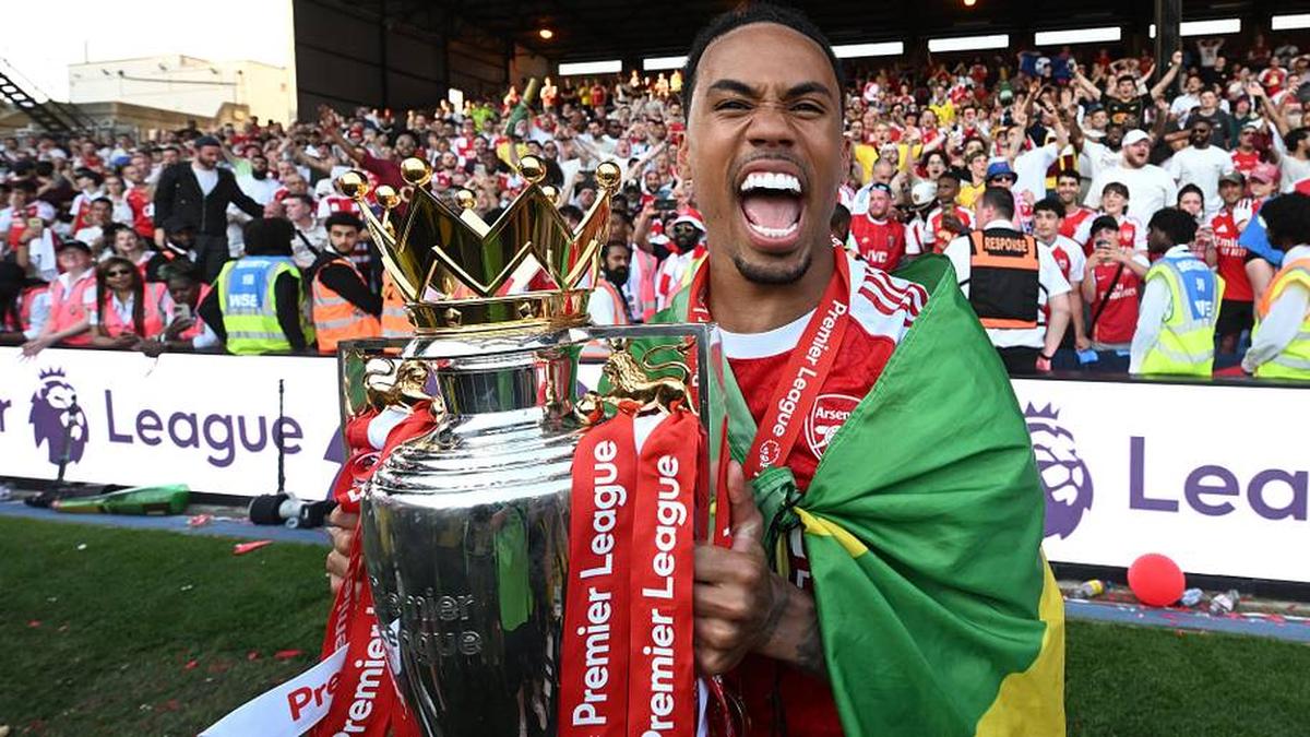  Gabriel enjoyed lifting the trophy. | Stuart MacFarlane/Arsenal FC/Getty Images 