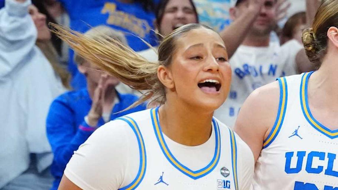  Apr 3, 2026; Phoenix, AZ, USA; UCLA Bruins forward Sienna Betts (16) and forward Amanda Muse (33) react with teammates on the bench during the second half of a semifinal of the Final Four of the women's 2026 NCAA Tournament against the Texas Longhorns at Mortgage Matchup Center. Mandatory Credit: Kirby Lee-Imagn Images | Kirby Lee-Imagn Images 