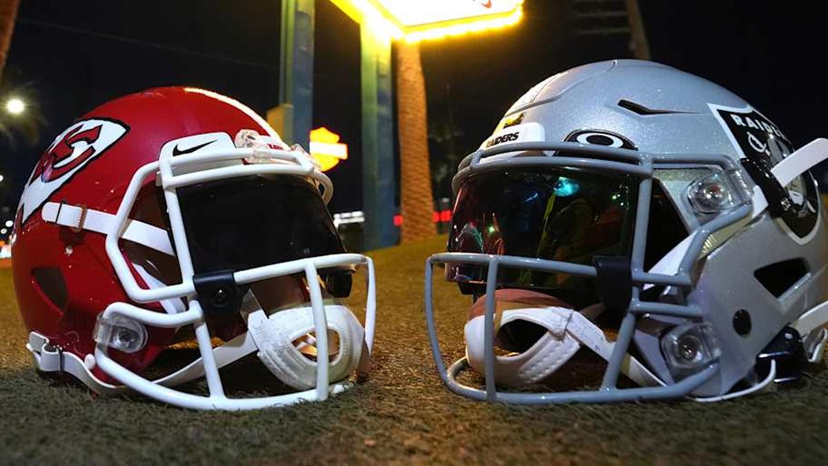  Jan 4, 2026; Paradise, Nevada, USA; Kansas City Chiefs and Las Vegas Raiders helmets at the Welcome to Fabulous Las Vegas sign. Mandatory Credit: Kirby Lee-Imagn Images | Kirby Lee-Imagn Images 