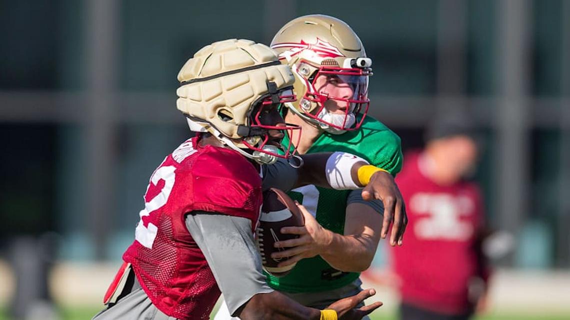  Florida State Seminoles quarterback Kevin Sperry (9) fakes a handoff during practice Thursday, April 9, 2026. | Alicia Devine/Tallahassee Democrat / USA TODAY NETWORK via Imagn Images 