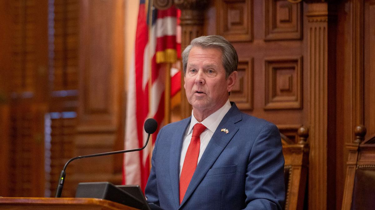 Georgia Gov. Brian Kemp signs into law bills that critics say make it more difficult for voters and election administrators. (Arvin Temkar/The Atlanta Journal-Constitution/TNS)