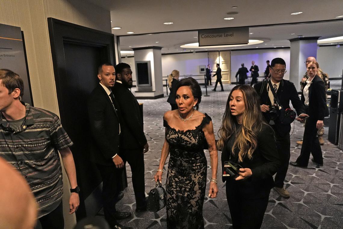 Jeanine Pirro, the U.S. attorney for the District of Columbia, is escorted out by security at the Washington Hilton during the White House Correspondents' Association dinner at the Washington Hilton on Saturday, April 25, 2026. (Salwan Georges/The New York Times)