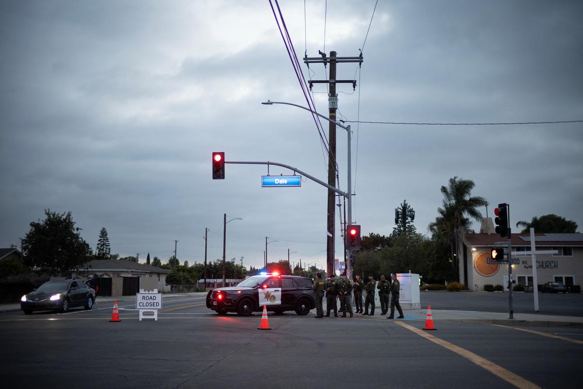 Law enforcement officers enforce a roadblock near an evacuation zone, after residents were ordered to evacuate because of a failing tank containing methyl methacrylate, a flammable liquid used in the aerospace industry, in Stanton, California, U.S., May 23, 2026,  REUTERS/Ed Ou