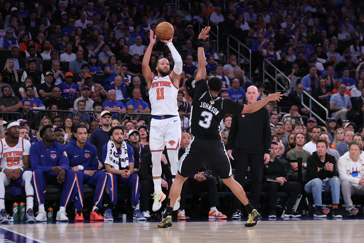 Jun 10, 2026; New York, New York, USA; New York Knicks guard Jalen Brunson (11) shoots against San Antonio Spurs forward Keldon Johnson (3) in the second quarter during game four of the 2026 NBA Finals at Madison Square Garden. Mandatory Credit: Brad Penner-Imagn Images