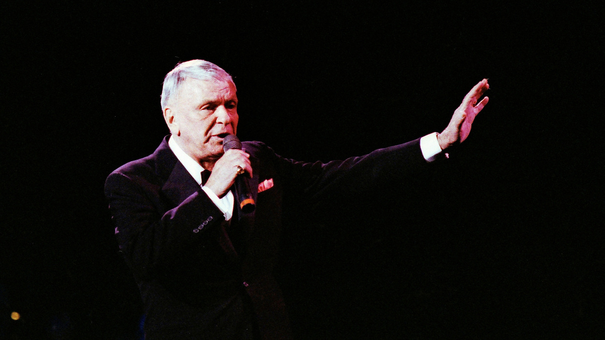 FILE PHOTO: Singer Frank Sinatra performs at the Royal Albert Hall in London, Britain May 26, 1992.  REUTERS/Dylan Martinez/File Photo