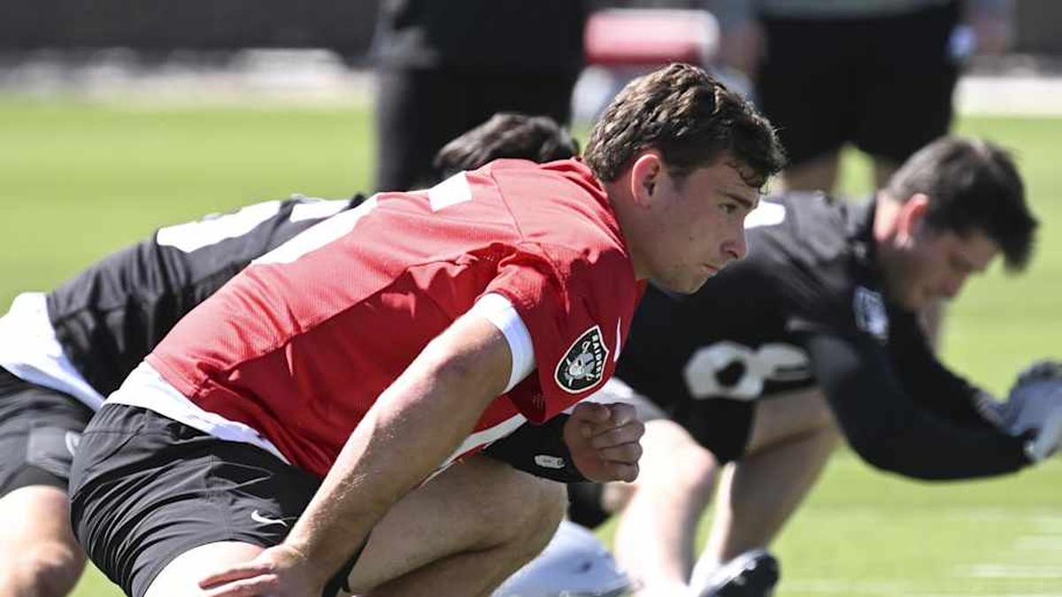  May 2, 2026; Henderson, NV, USA; Las Vegas Raiders quarterback Fernando Mendoza (15) runs through a drill during a Rookie Minicamp at Intermountain Health Performance Center. Mandatory Credit: Candice Ward-Imagn Images | Candice Ward-Imagn Images 