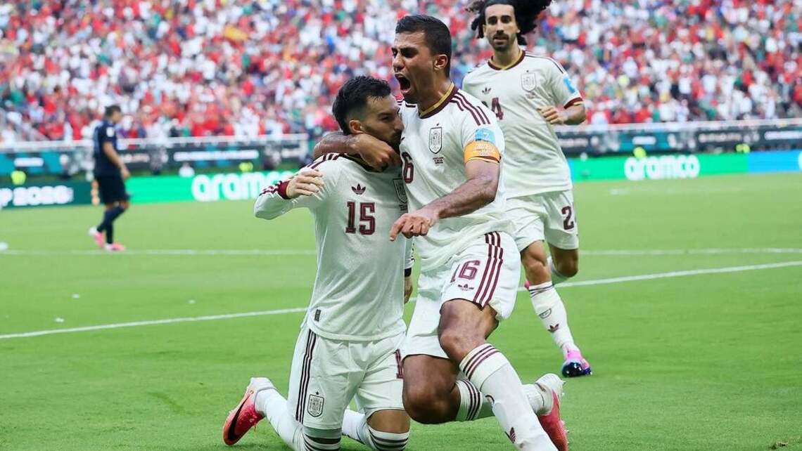 Spain eke out win to finish atop Group H, eliminate Uruguay 
