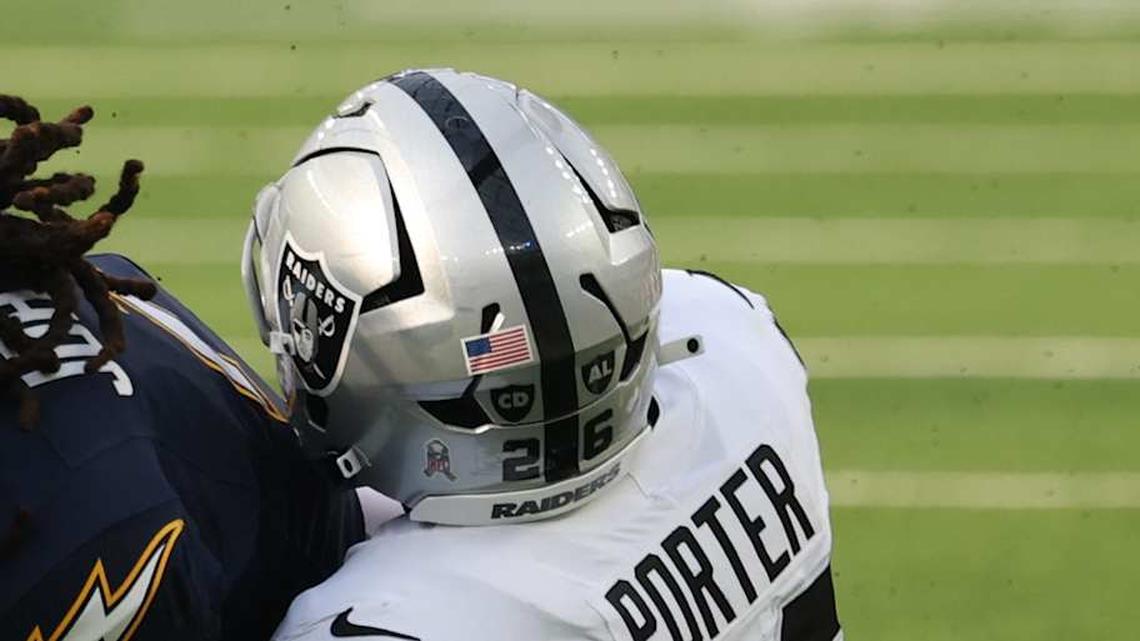  Nov 30, 2025; Inglewood, California, USA; Los Angeles Chargers wide receiver Quentin Johnston (1) makes a catch against the Las Vegas Raiders cornerback Darien Porter (26) during the first half at SoFi Stadium. Mandatory Credit: Kiyoshi Mio-Imagn Images | Kiyoshi Mio-Imagn Images 
