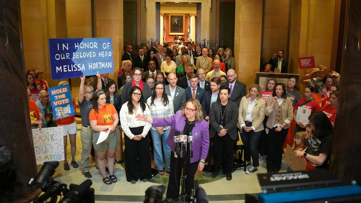 Rep. Emma Greenman, DFL-Minneapolis, who represents the area around Annunciation, led a news conference as Minnesota Democrats emerged from the House chamber after a 36-hour sit-in to protest the lack of a vote on gun control measures in May. (Glen Stubbe/The Minnesota Star Tribune/TNS)