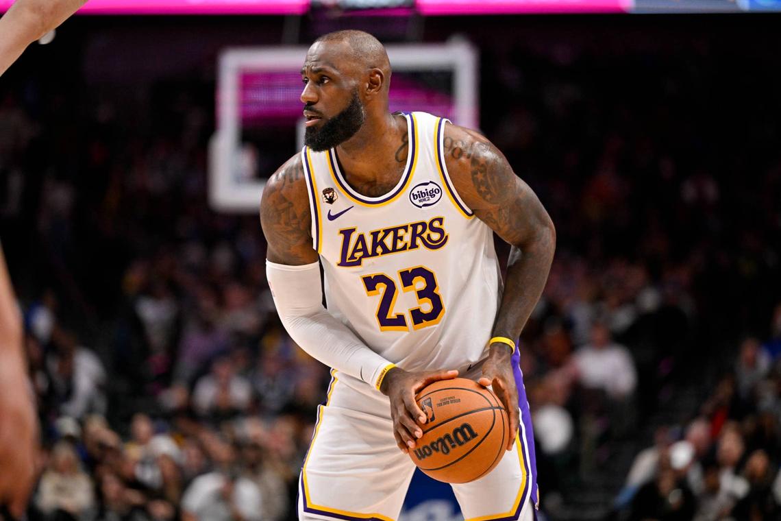  Jan 24, 2026; Dallas, Texas, USA; Los Angeles Lakers forward LeBron James (23) looks to move the ball against the Dallas Mavericks during the game at the American Airlines Center. Mandatory Credit: Jerome Miron-Imagn Images 