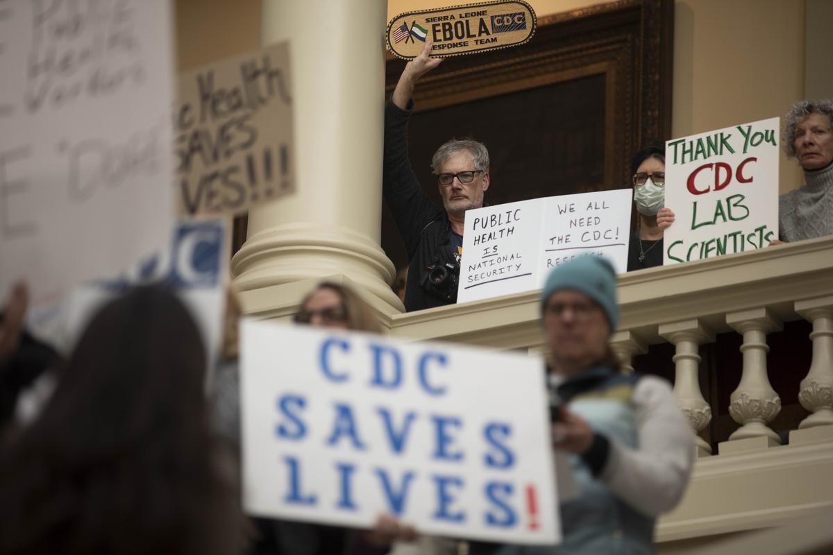 FILE -- People protesting the deep staffing cuts the Trump administration made to the Centers for Disease Control and Prevention, at the Georgia Capitol in Atlanta on Friday, Feb. 21, 2025. The Trump administration's lack of communication and sluggish response to a hantavirus outbreak suggest the United States is ill prepared for a larger health crisis, such as another pandemic. (Alyssa Pointer/The New York Times)
