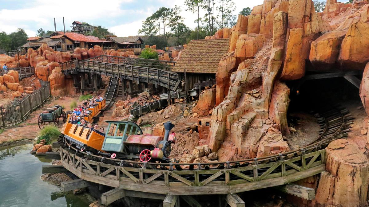 Guests ride Big Thunder Mountain Railroad at the Magic Kingdom, at Walt Disney World in Bay Lake, Florida, Feb. 19, 2024. Disney Co. announced that half of a planned $60 billion investment over the next 10 years will go toward expansions at their theme parks worldwide. (Joe Burbank/Orlando Sentinel/TNS)