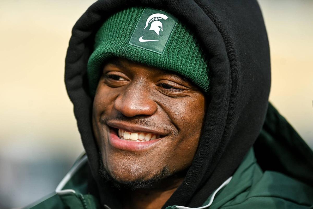  Former Michigan State running back Kenneth Walker III smiles while interacting with fans during the Spartans' game against Indiana in East Lansing, Michigan, on Nov. 19, 2022. USA TODAY Network via Reuters Connect