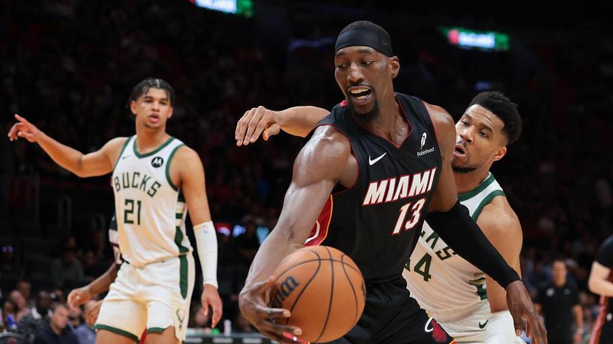  Mar 12, 2026; Miami, Florida, USA; Miami Heat center Bam Adebayo (13) protects the basketball against Milwaukee Bucks forward Giannis Antetokounmpo (34) during the third quarter at Kaseya Center. Mandatory Credit: Sam Navarro-Imagn Images | Sam Navarro-Imagn Images 