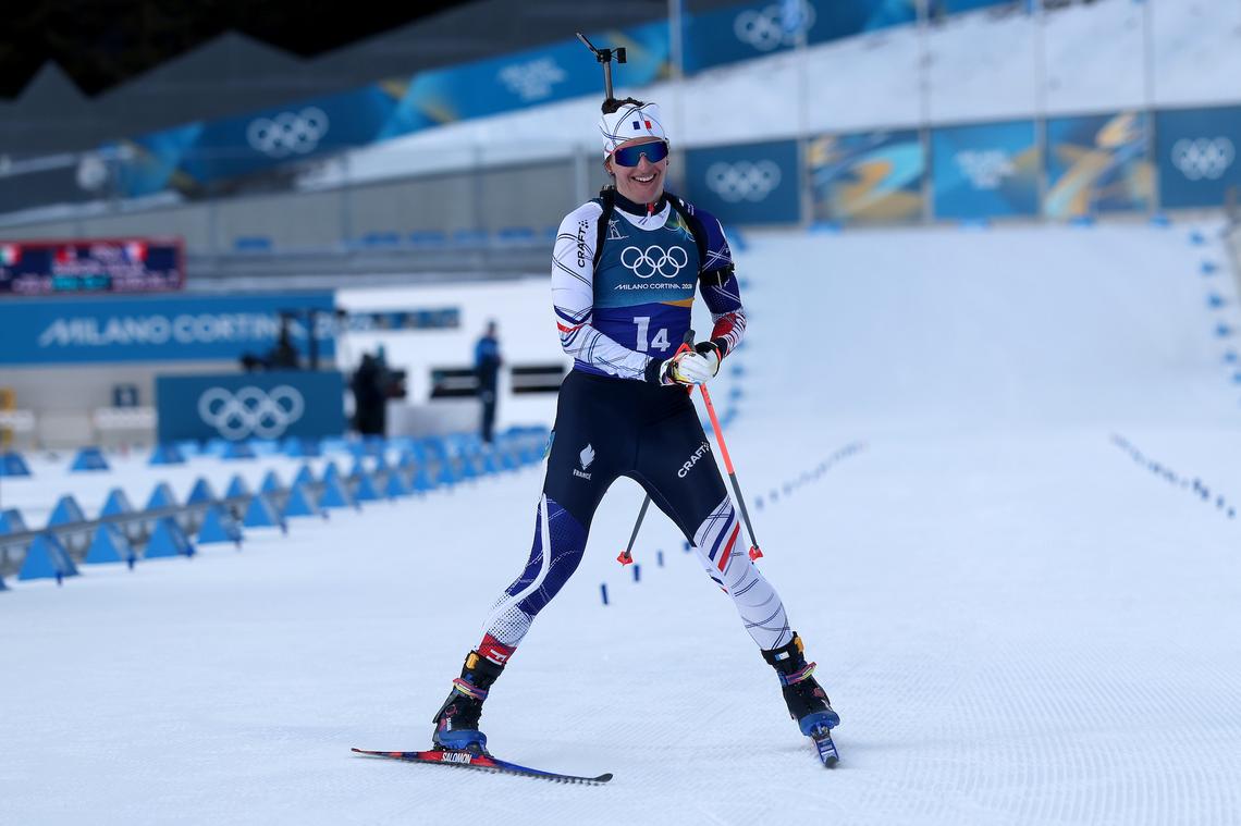  Julia Simon of Team France celebrates as she crosses the finishing line to win Gold in the Mixed Relay 4 x 6km.Michael Steele/Getty Images 