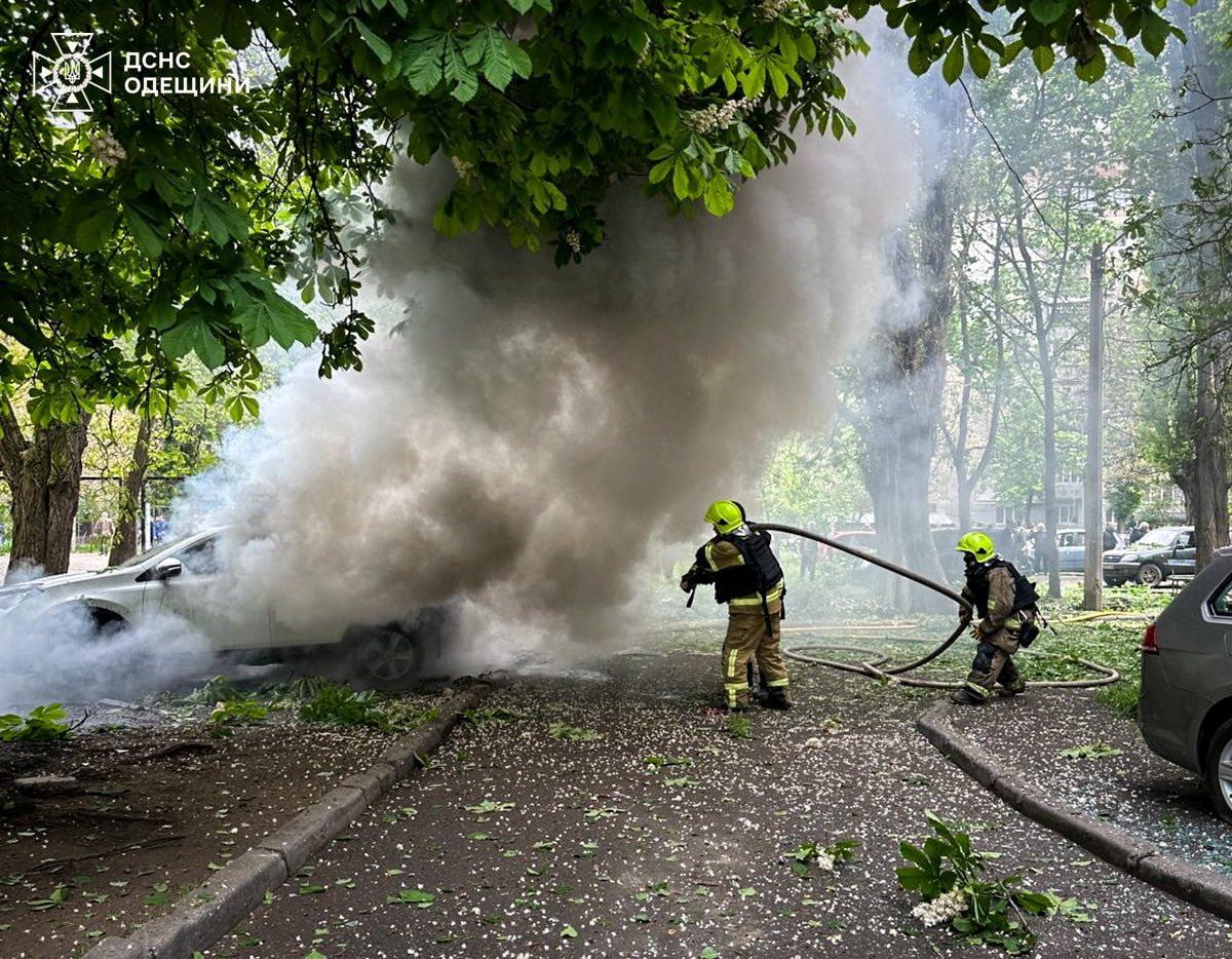 Firefighters extinguish a burning car which was damaged during a Russian drone strike, amid Russia's attack on Ukraine, in Odesa, Ukraine, May 13, 2026. Press service of the State Emergency Service of Ukraine in Odesa region/Handout via REUTERS