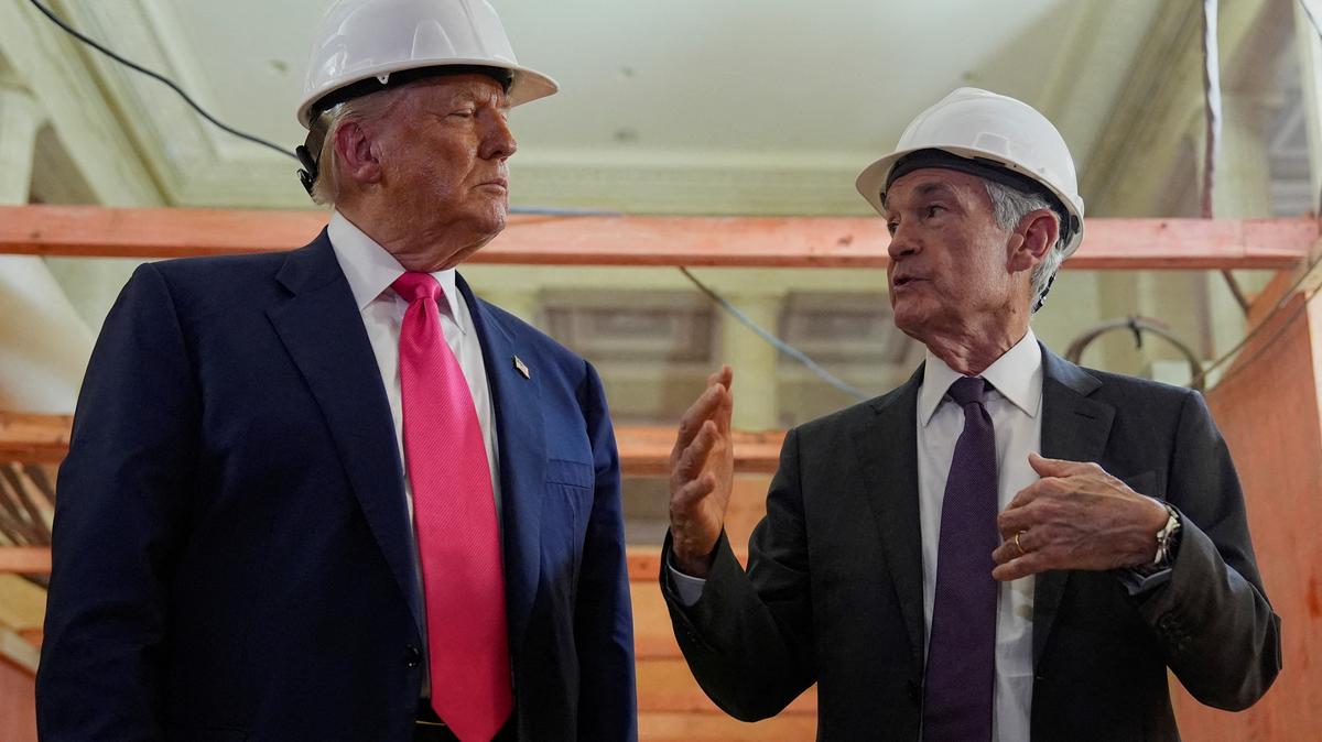 FILE PHOTO: U.S. President Donald Trump and Federal Reserve Chair Jerome Powell speak during a tour of the Federal Reserve Board building, which is currently undergoing renovations, in Washington, D.C., U.S., July 24, 2025. REUTERS/Kent Nishimura/File Photo