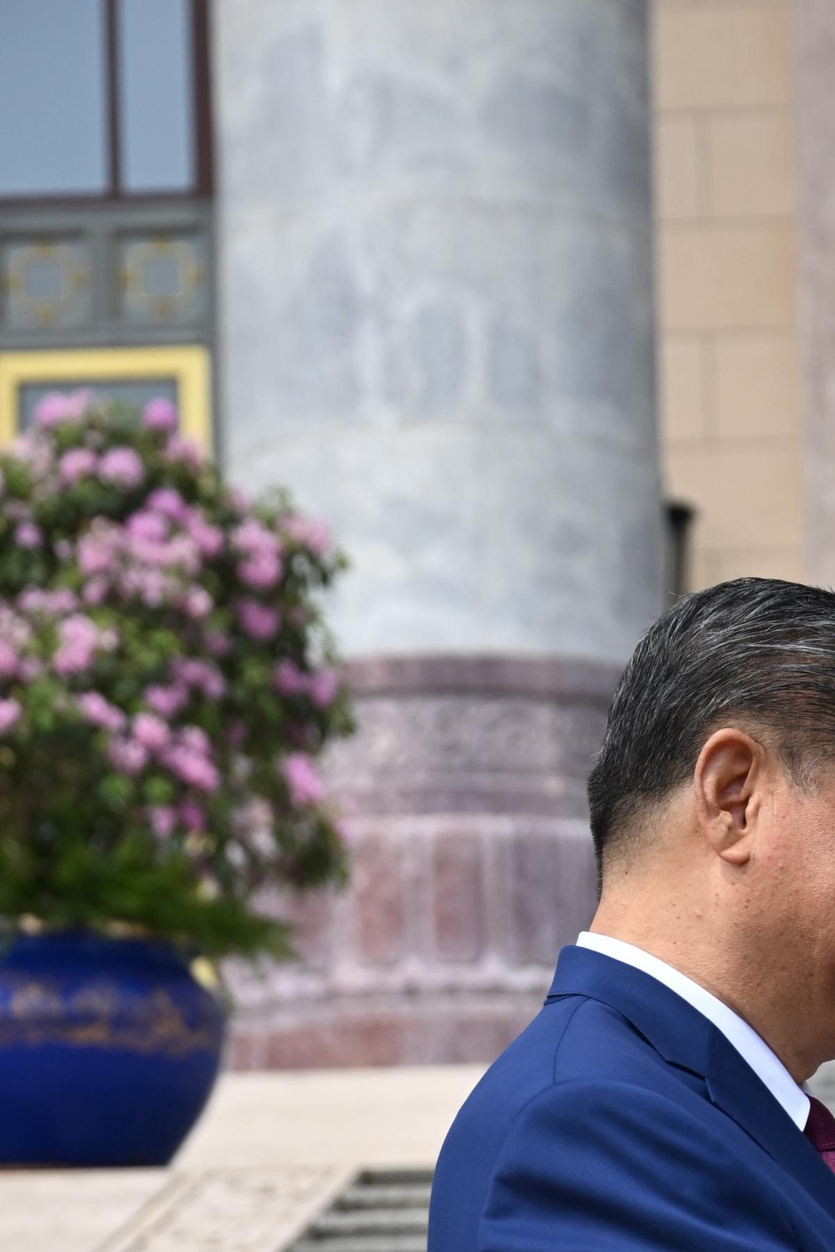 President Xi Jinping of China greets President Donald Trump outside the Great Hall of the People in Beijing during their two-day summit, on Thursday, May 14, 2026. During the first U.S. presidential visit to China in nearly a decade, Xi delivered a warning on Taiwan, saying that the issue, if handled poorly, could lead to conflict and "an extremely dangerous situation." (Kenny Holston/The New York Times)..