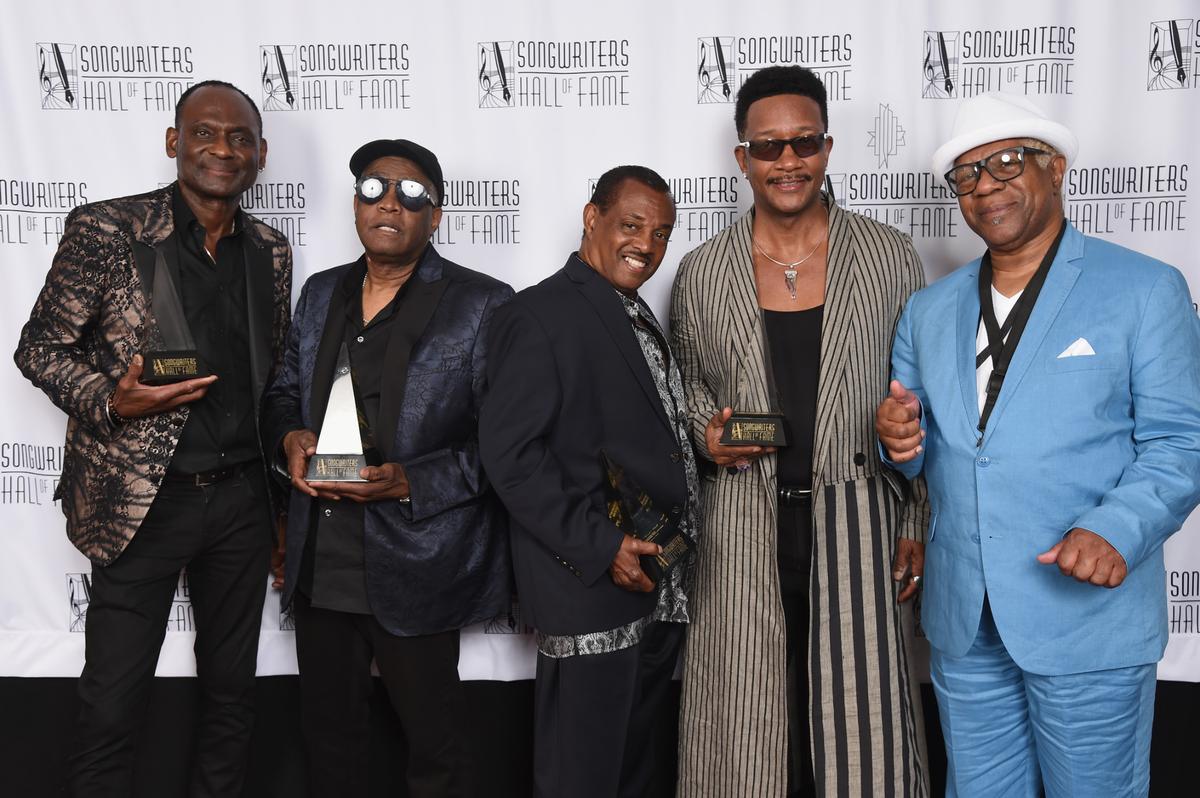 (L-R) George Brown, Ronald Bell, Robert “Kool” Bell, James “JT” Taylor and Dennis Thomas of Kool & The Gang pose with their awards backstage on June 14, 2018 in New York City. 