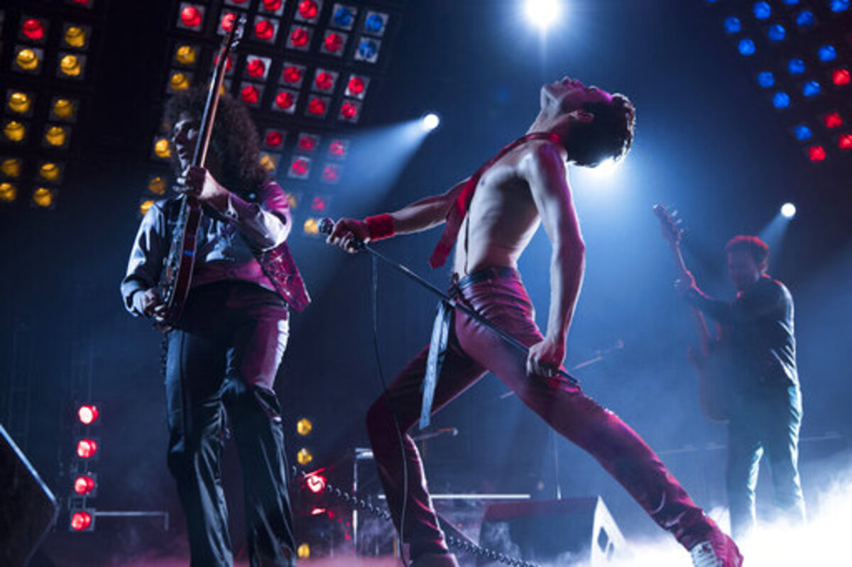 Gwilym Lee, left, Rami Malek and Joe Mazzello in a scene from “Bohemian Rhapsody.”