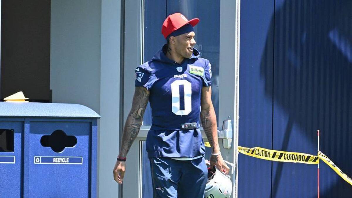  Jun 9, 2026; Foxborough, MA, USA; New England Patriots cornerback Christian Gonzalez (0) arrives to the practice field for minicamp at Gillette Stadium. Mandatory Credit: Eric Canha-Imagn Images | Eric Canha-Imagn Images 