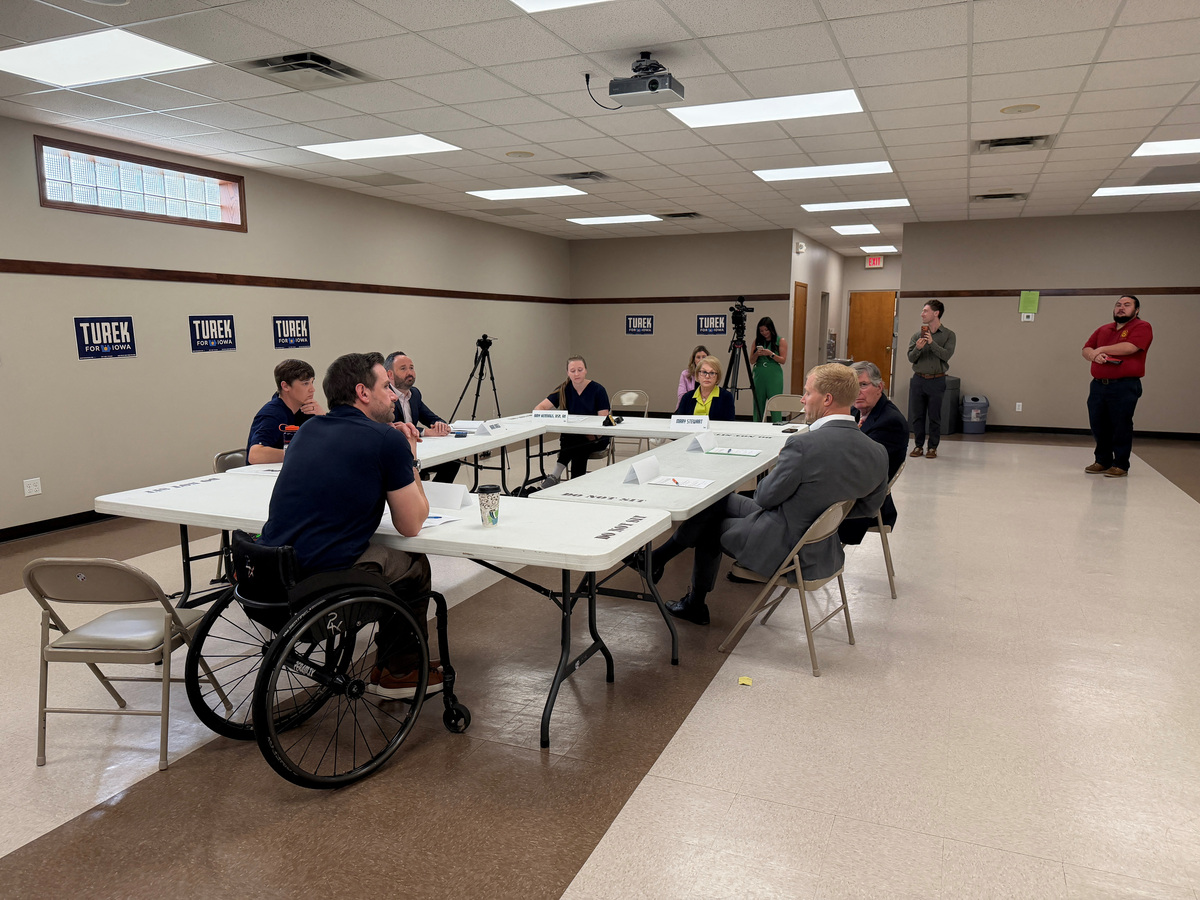 Josh Turek, the Democrat running for Iowa's open Senate seat, convenes a roundtable discussion on healthcare in Des Moines, Iowa, U.S., June 22, 2026. Picture taken with a mobile phone. REUTERS/Nathan Layne