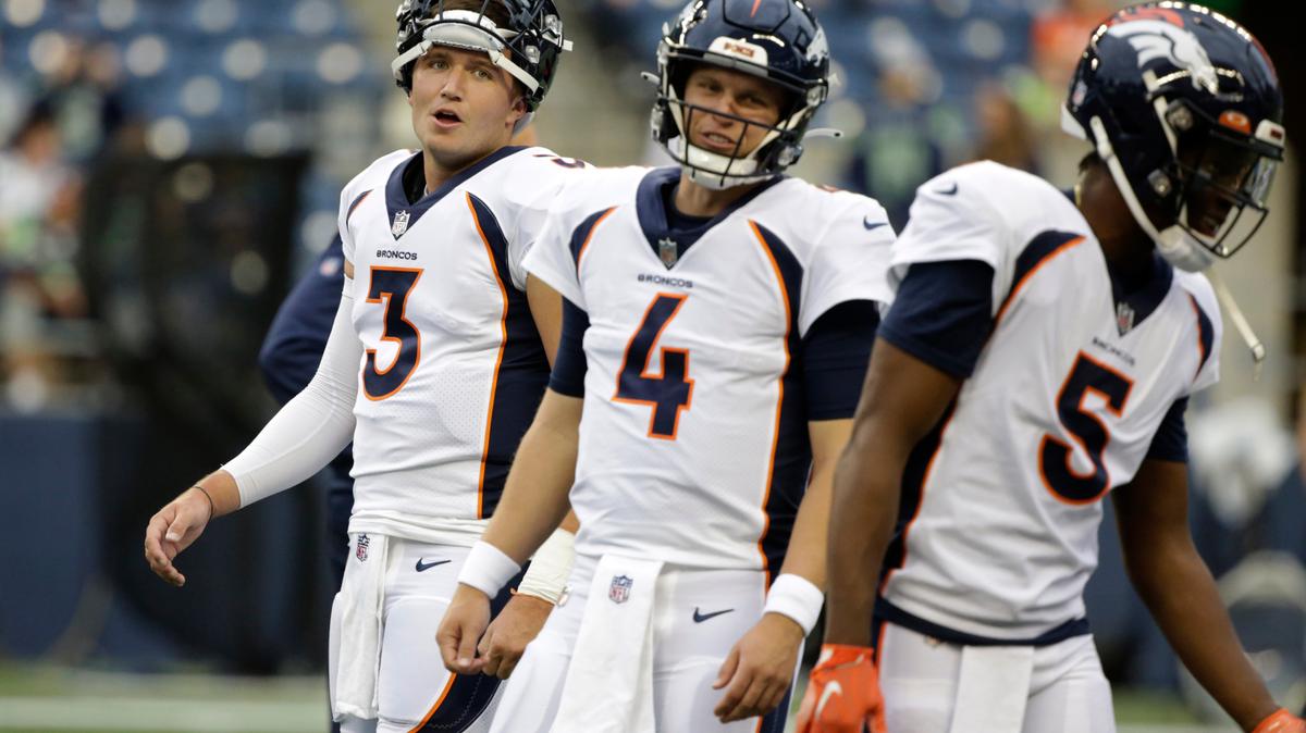 Denver Broncos quarterbacks Drew Lock (3), Brett Rypien (4) and Teddy Bridgewater (5) line up during warmups for the team’s NFL preseason football game against the Seattle Seahawks, Saturday, Aug. 21, 2021, in Seattle. (AP Photo/Jason Redmond)