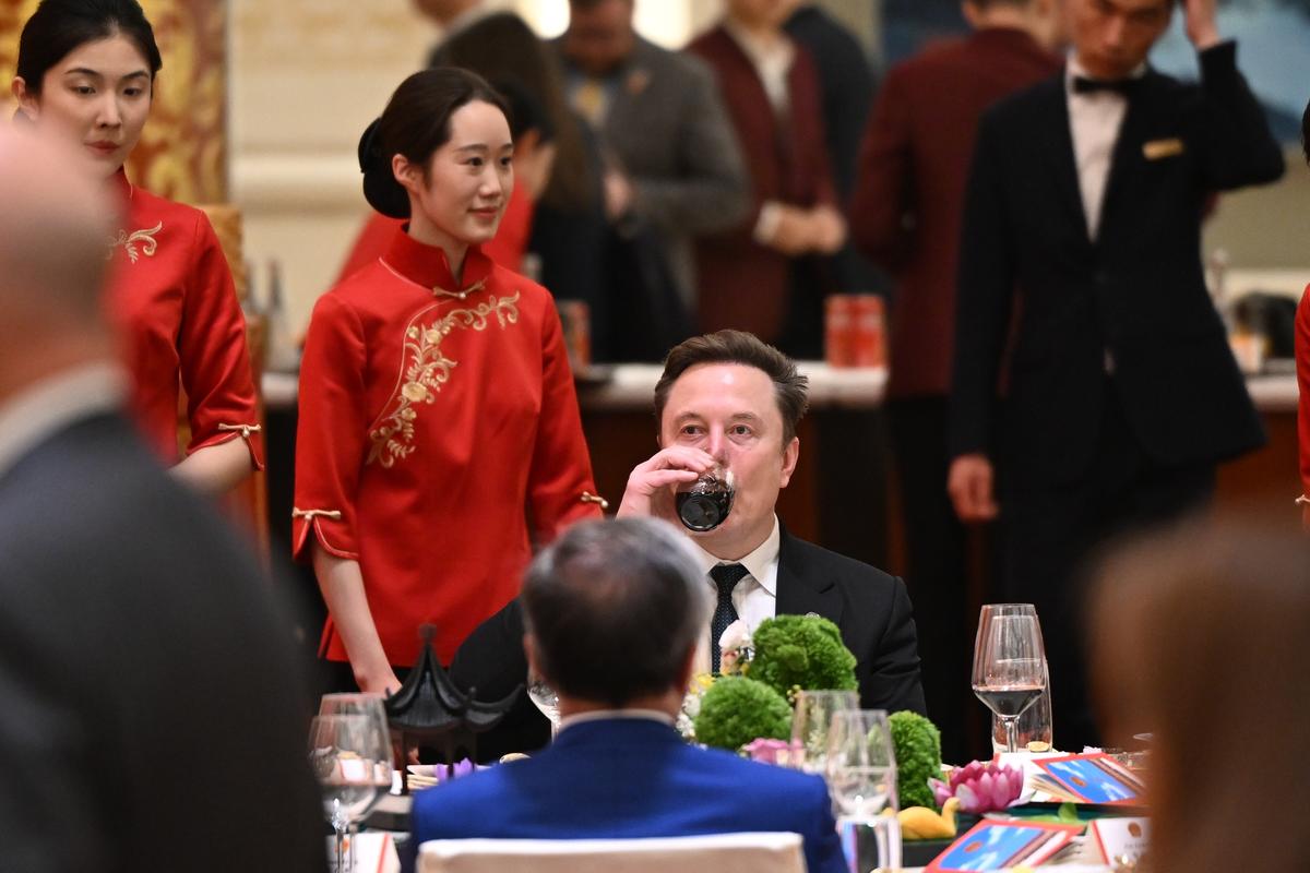 Elon Musk attends a state banquet during the summit between President Donald Trump and President Xi Jinping of China, at the Great Hall of the People in Beijing on Thursday, May 14, 2026. During the first U.S. presidential visit to China in nearly a decade, Xi delivered a warning on Taiwan, saying that the issue, if handled poorly, could lead to conflict and "an extremely dangerous situation." (Kenny Holston/The New York Times)..