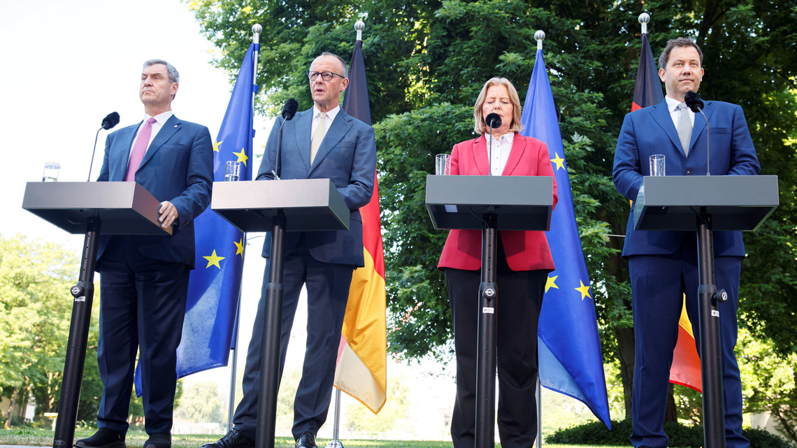 Under fire German ruling coalition unveils reform package