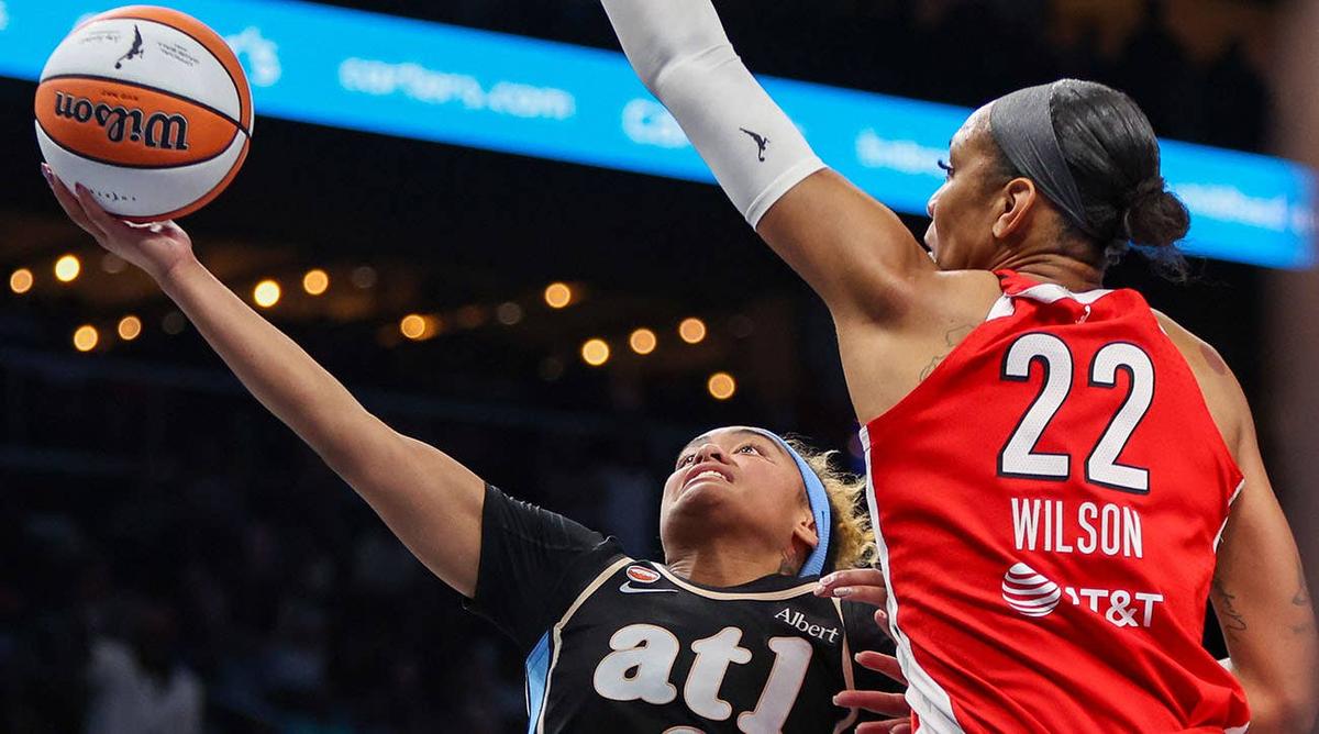  Atlanta Dream guard Te-Hina Paopao shoots the ball as Las Vegas Aces center A'ja Wilson defends at State Farm Arena on May 17, 2026. Brett Davis-Imagn Images