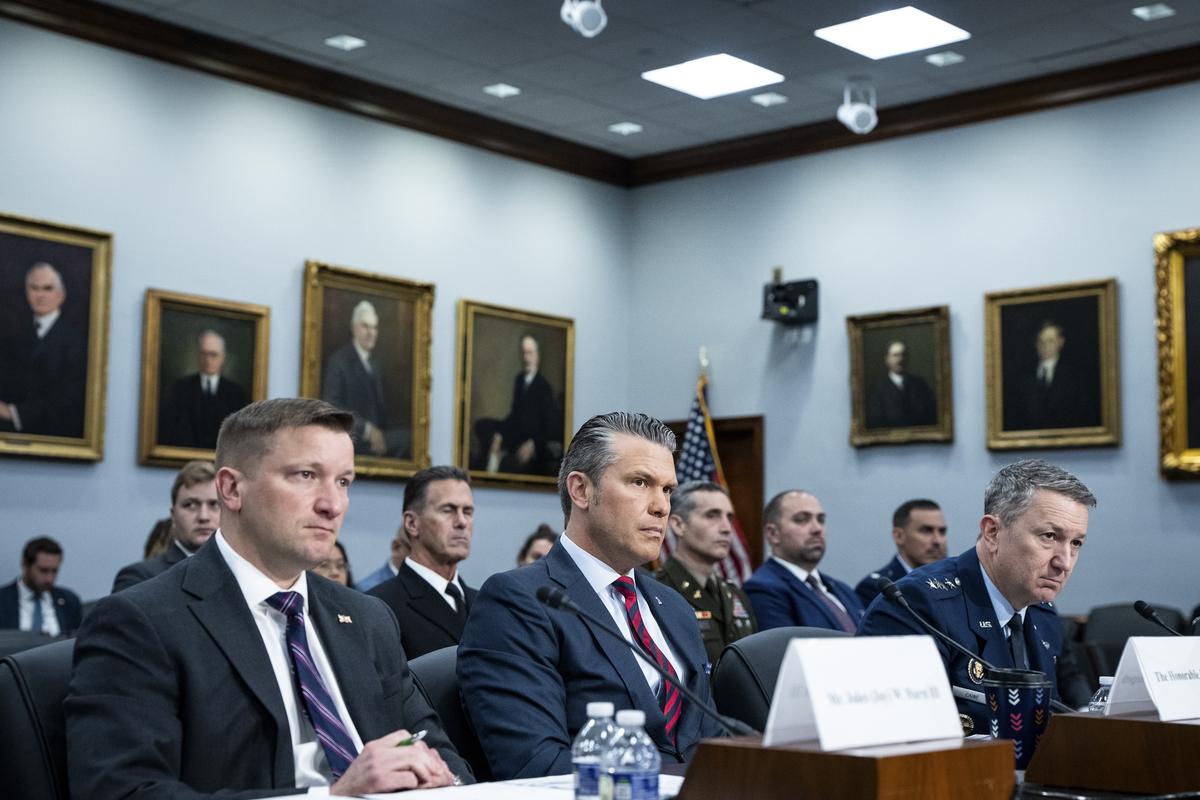 Defense Secretary Pete Hegseth, center, and Gen. Dan Caine, the chairman of the Joint Chiefs of Staff, right, testify before the House Appropriations subcommittee on Defense on Capitol Hill in Washington, on Tuesday, May 12, 2026. (Haiyun Jiang/The New York Times)