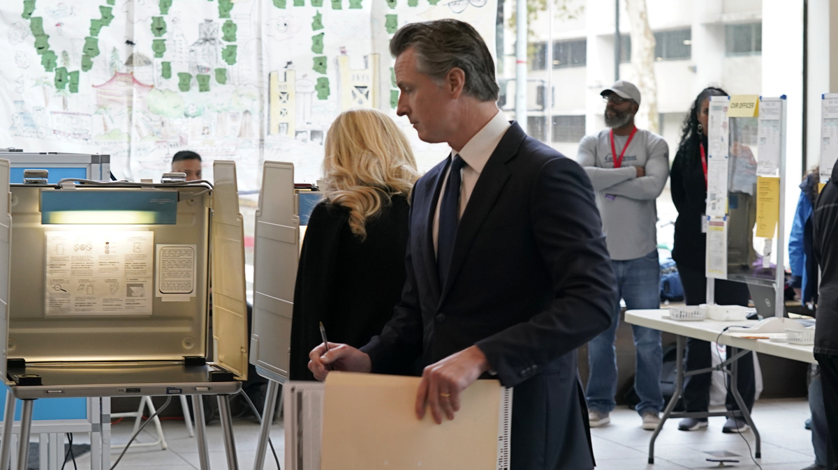 Gavin Newsom. With ballot in hand, California Governor Gavin Newsom walks to a voting booth in Sacramento, California, on Tuesday, November 8, 2022.