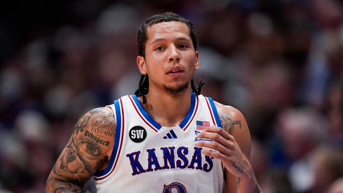  Feb 7, 2026; Lawrence, Kansas, USA; Kansas Jayhawks guard Tre White (3) reacts during the first half against the Arizona Wildcats at Allen Fieldhouse. Mandatory Credit: Jay Biggerstaff-Imagn Images | IMAGN IMAGES via Reuters Connect 