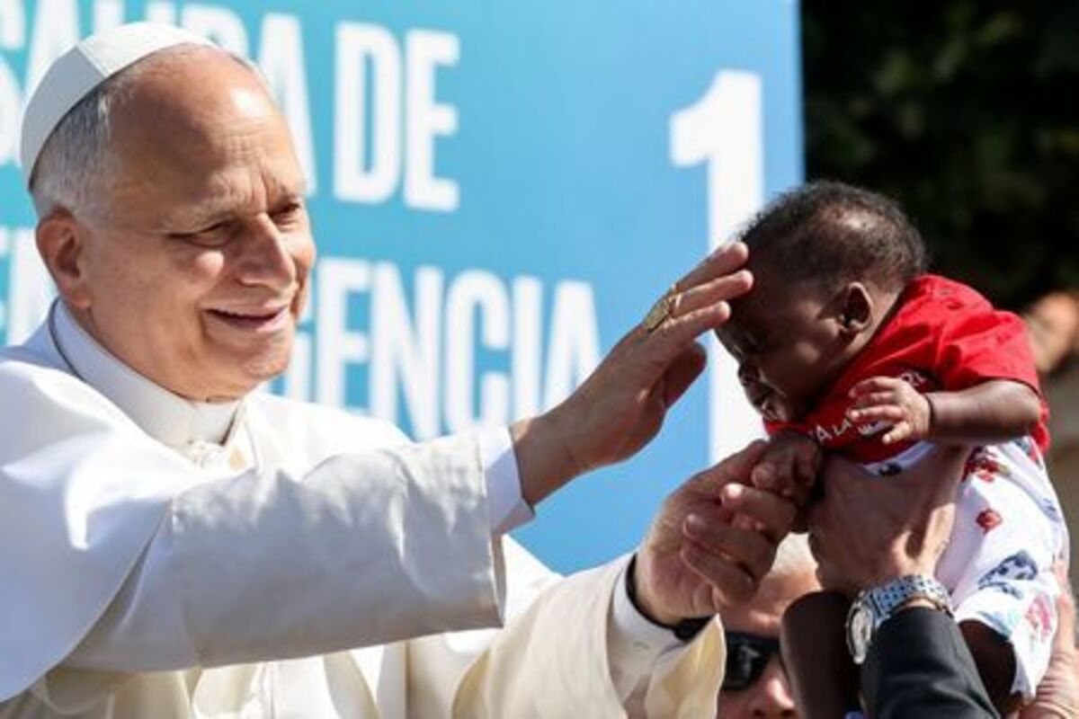 Pope Leo XIV blesses a child at the Plaza del Cristo de La Laguna, Tenerife, Canary Islands, Spain, June 12, 2026, on the day he meets with migrants and humanitarian organizations, as part of a seven-day apostolic journey to Spain, with visits to Madrid, Barcelona and the Canary Islands. REUTERS/Yara Nardi