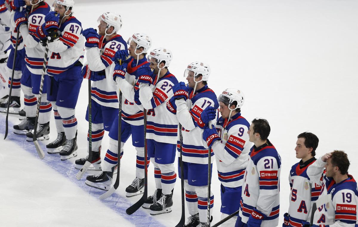 Ice Hockey - IIHF World Championships - Quarter Final - Canada v United States - BCF Arena, Fribourg, Switzerland - May 28, 2026 Players of the U.S. look dejected after the match REUTERS/David W Cerny