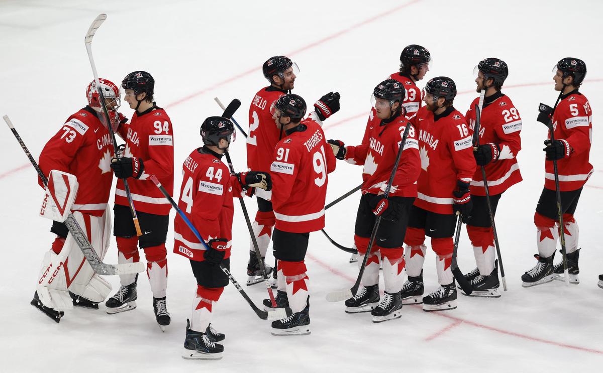 Ice Hockey - IIHF World Championships - Quarter Final - Canada v United States - BCF Arena, Fribourg, Switzerland - May 28, 2026 Canada players celebrate after the match REUTERS/David W Cerny