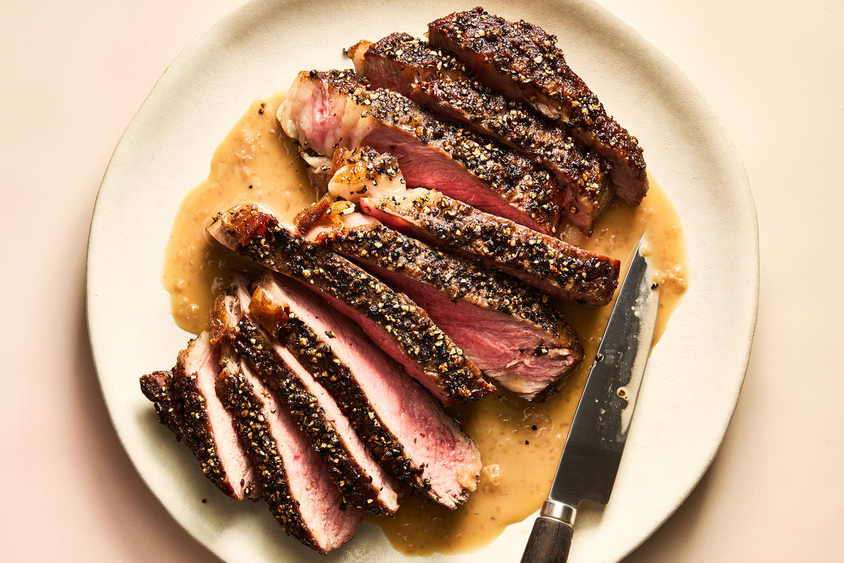 Steak au Poivre for two. A steak dinner is worthy of occasion. Make it well with Ali Slagle's tips. Food Stylist: Brett Regot. (Armando Rafael/The New York Times)