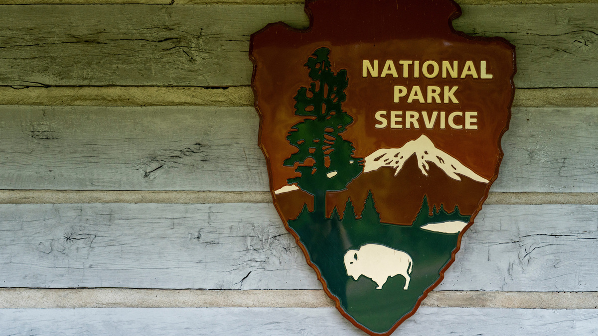 The National Park Service logo is seen on the Parkway Information Cabin near Natchez Trace Parkway in Ridgeland, Miss., on Wednesday, April 15, 2026.