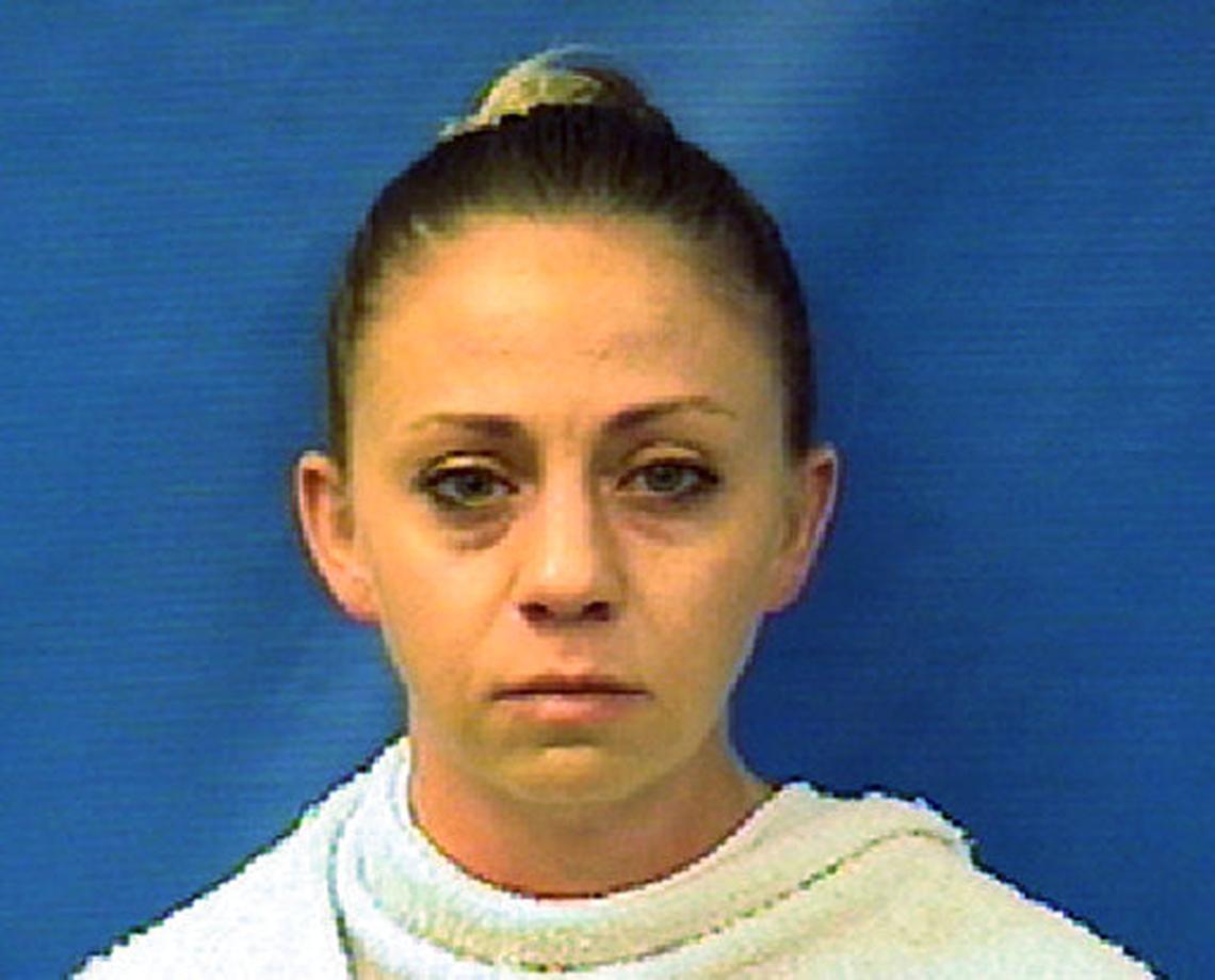 FILE - This file photo provided by the Kaufman County Sheriff’s Office shows Amber Guyger. A grand jury began hearing evidence Monday, Nov. 26, 2018, in the case of Guyger, a former Dallas police officer who fatally shot her unarmed black neighbor in his own apartment after she said she mistook it for hers on Sept. 6, 2018. (Kaufman County (Texas) Sheriff’s Office via AP, File)