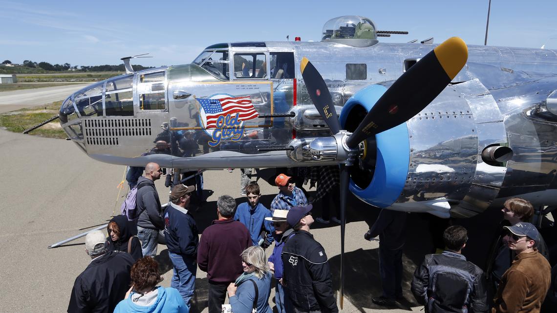 A B-25 Mitchell bomber draws a crowd at the Pacific Coast Dream Machines Show at the airport in Half Moon Bay. (Karl Mondon/Bay Area News Group)