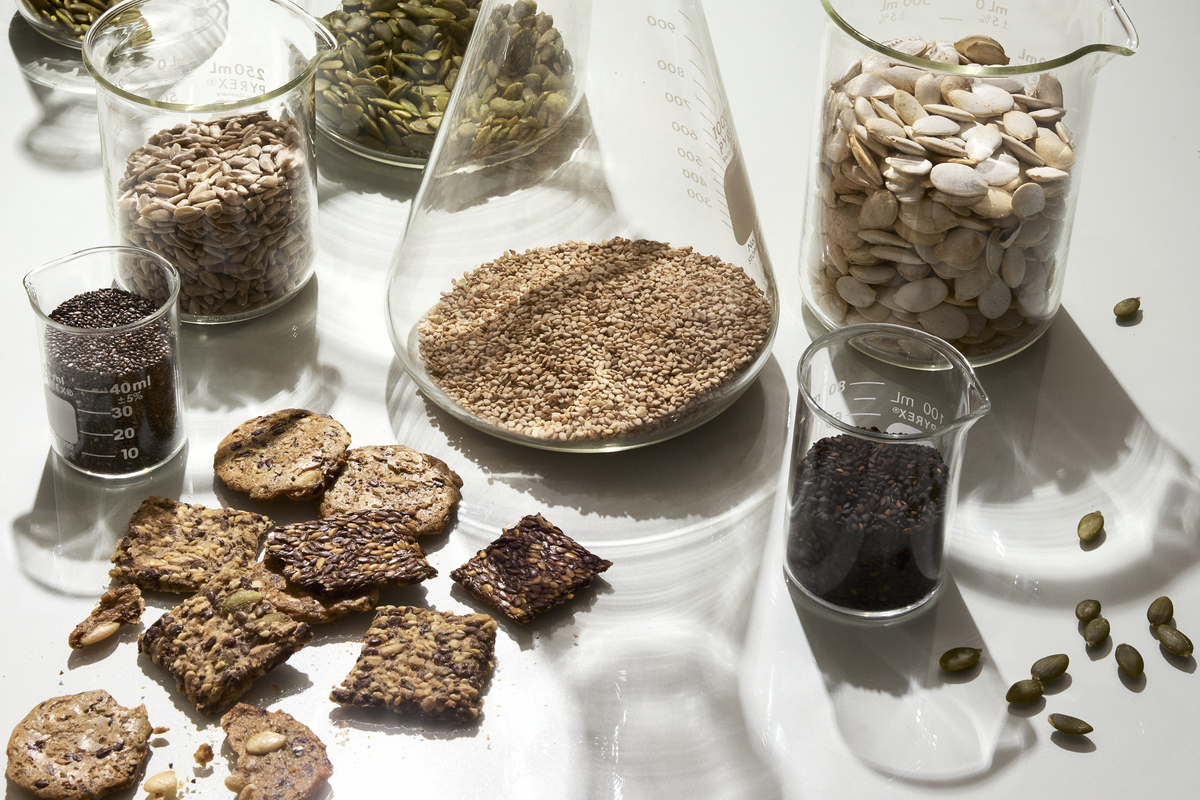 A variety of raw and prepared seeds, which have health benefits similar to nuts -- most notably in relation to heart health -- but certain seeds, like chia seeds and flax seeds, tend to have more fiber and heart-healthy omega-3 fatty acids, in New York, June 17, 2026. It's challenging to find the two nutrients in a single food, but these categories offer a nice mix. (Bobbi Lin/The New York Times)
