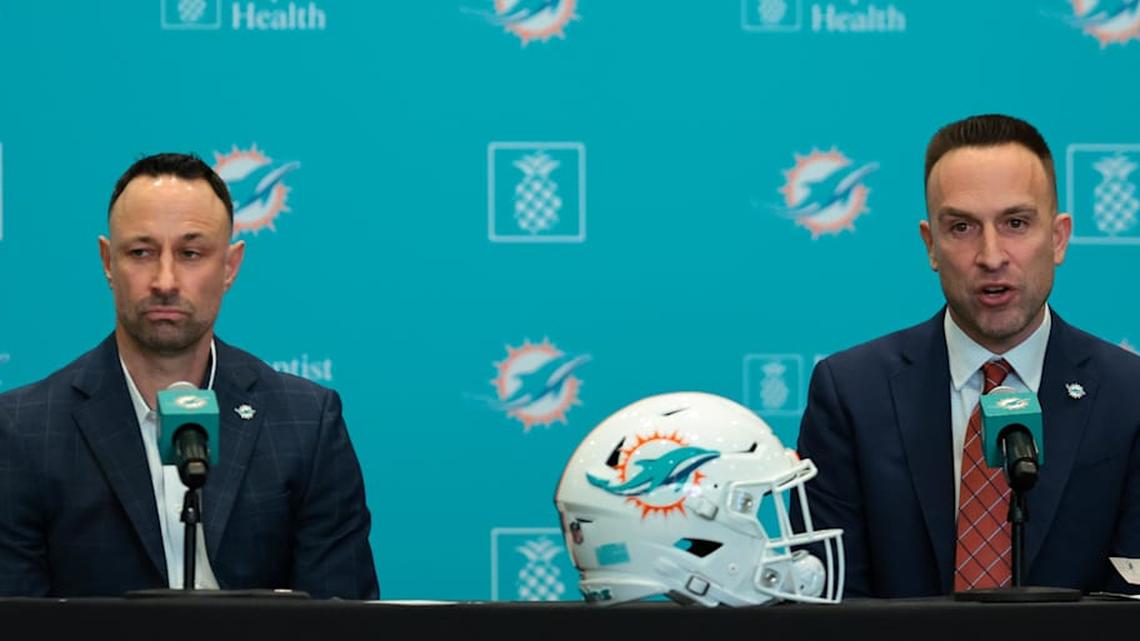 Jan 22, 2026; Miami Gardens, FL, USA; Miami Dolphins head coach Jeff Hafley, right, joined by general manager Jon-Eric Sullivan, left, speak to reporters during their introductory press conference at Baptist Health Training Complex. Mandatory Credit: Sam Navarro-Imagn Images | Sam Navarro-Imagn Images 